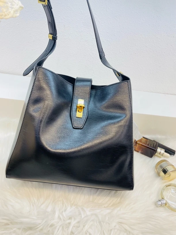 品牌女包71558暗袋单根托特水桶包单肩包轻奢小众欧若精灵风潮牌