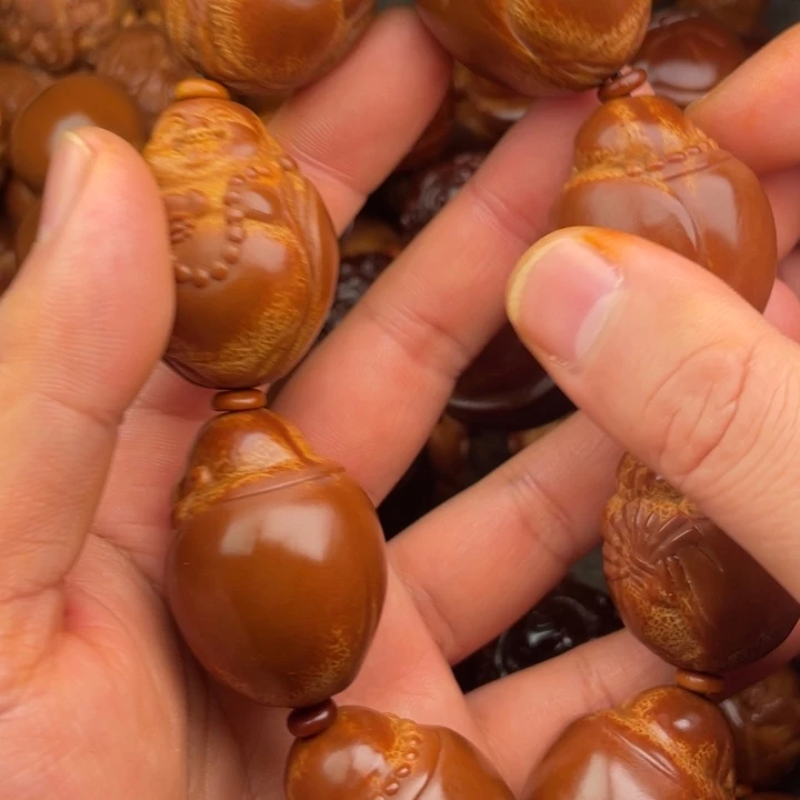 东***保橄榄核吊坠橄榄核