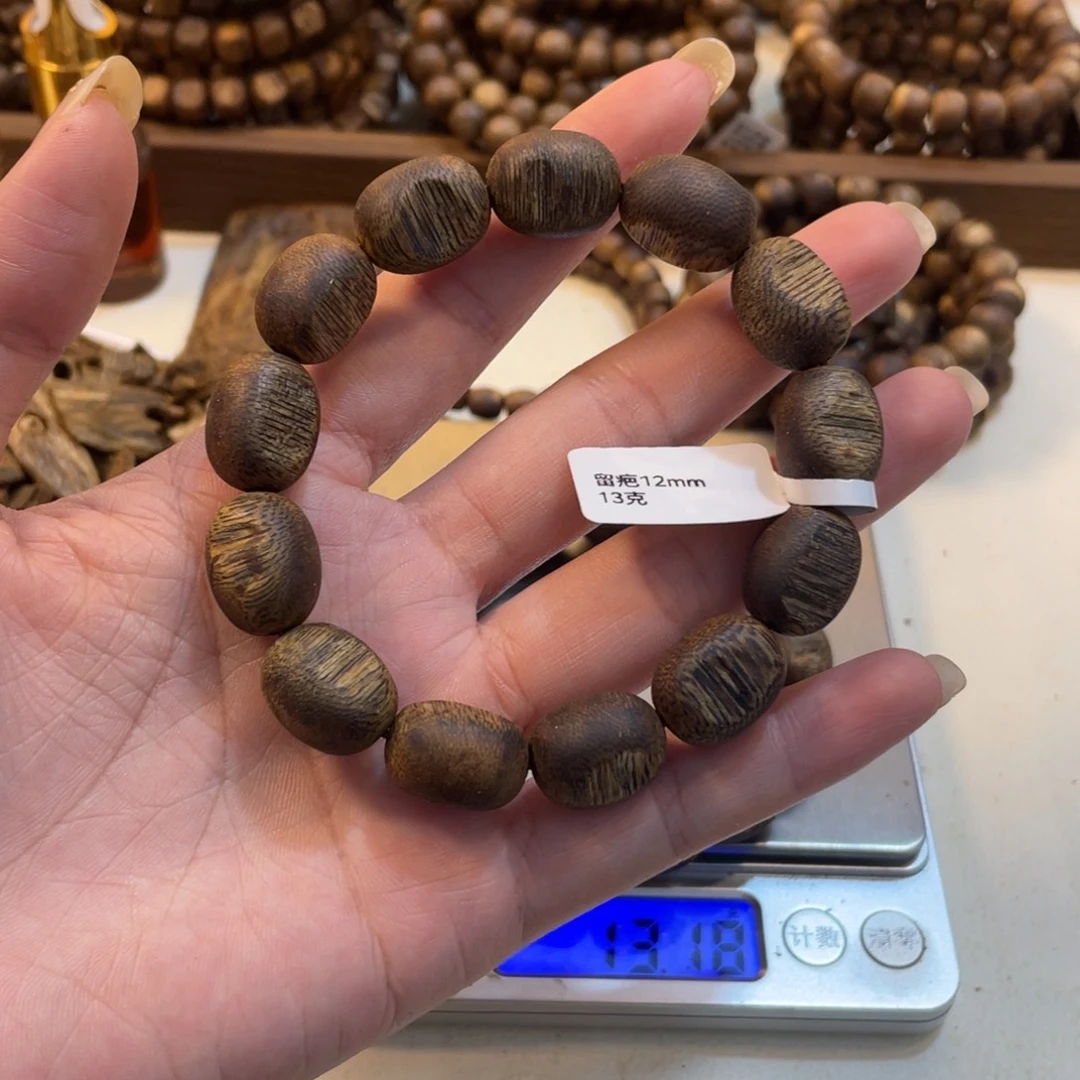沉香碎屑沉香卡1.2留疤珠13克+