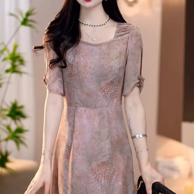 高级气质连衣裙女2025夏季爆款时尚设计感优雅修身收腰中长款裙子