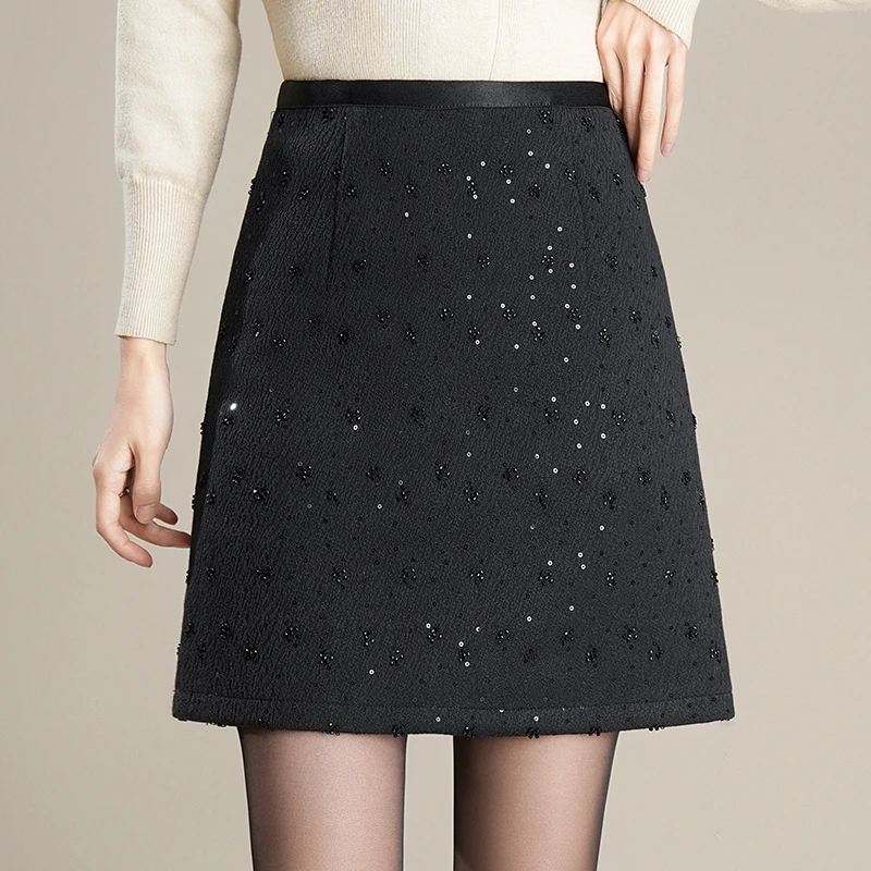 气质显瘦a字短裙半身裙女秋冬2025新款高腰时尚钉珠呢子包臀裙子
