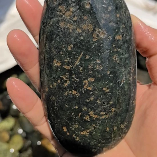 石材负**行藏玉药王石原石手把件一个