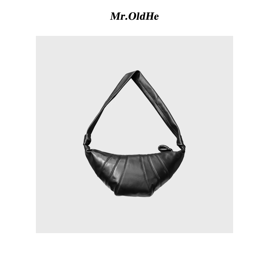黑色牛角宽肩带柔软皮斜跨单肩包