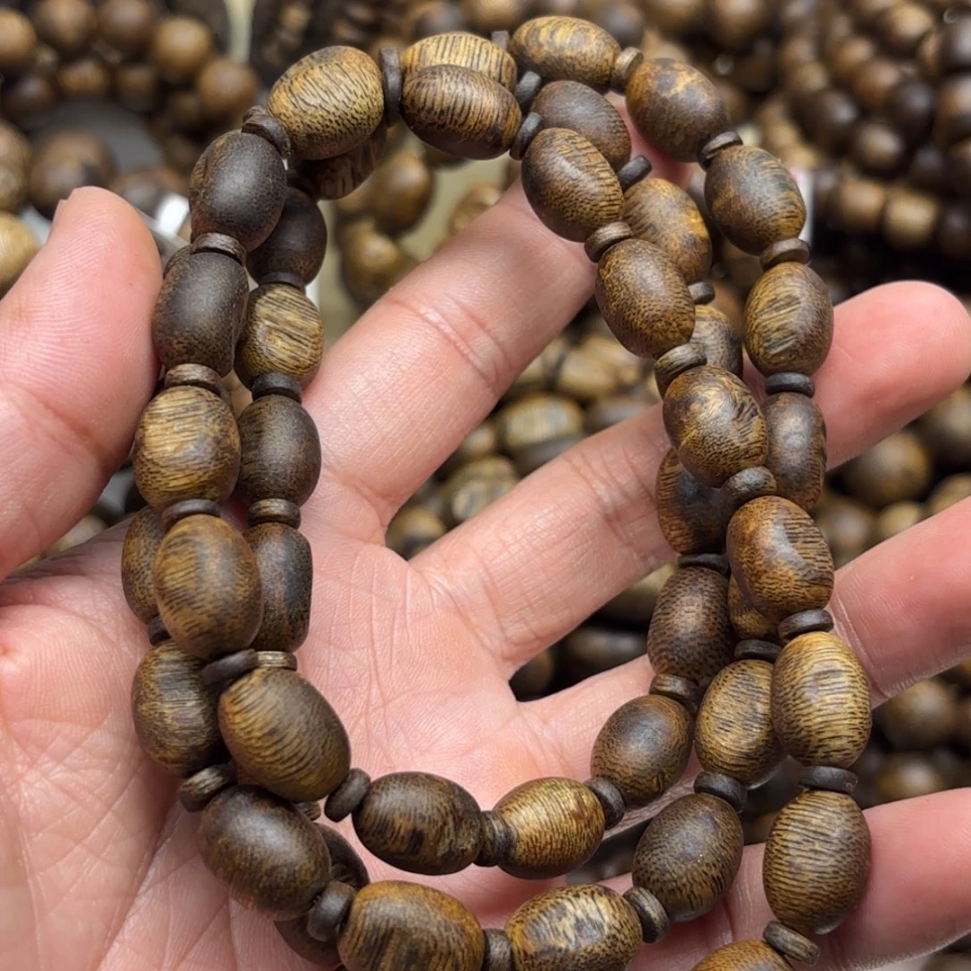 句***动沉香手串卡1.0多圈留疤34克