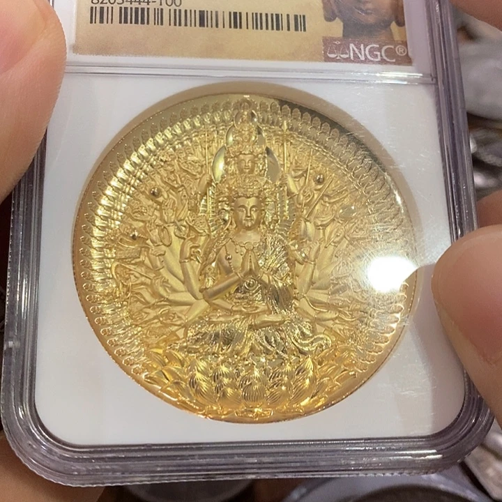 魔***下普通金属币如图一个纪念币