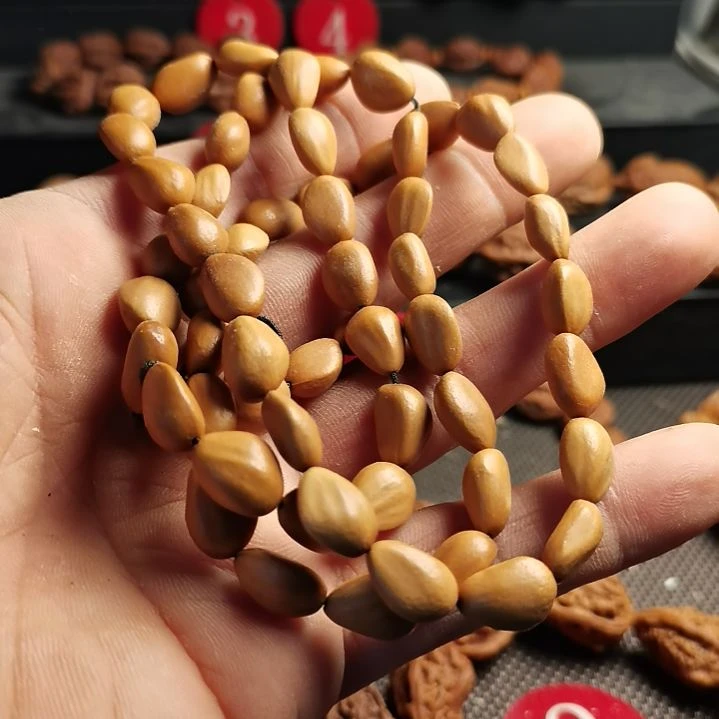 文玩核桃吊坠东北秋子异型核桃松籽30