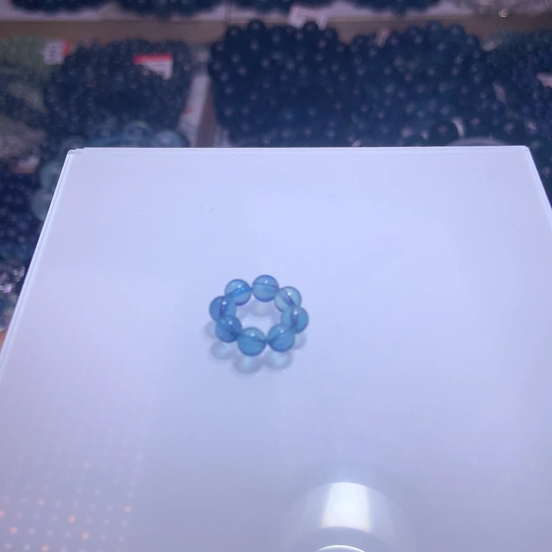 天然辰砂海蓝宝高冰透蓝跑环一个