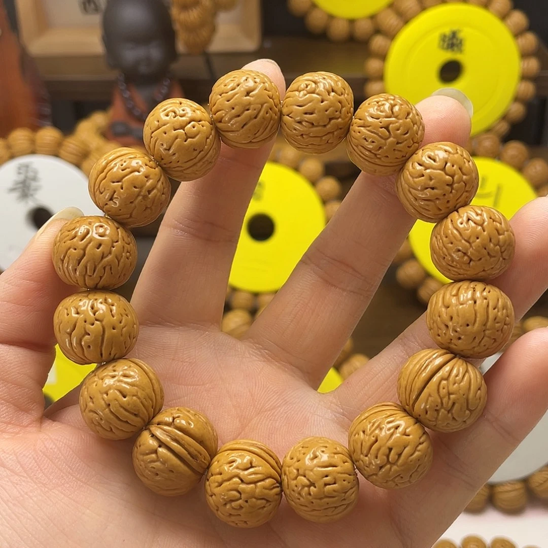 用***7桃核手串，桃核手串