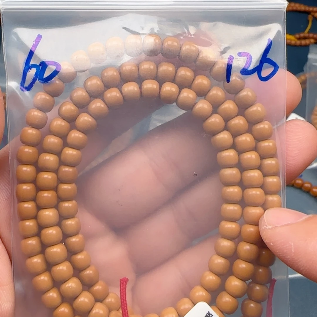 ****杨手串橄榄核老挝SS级核尖极限弧尺寸6×126颗全无白