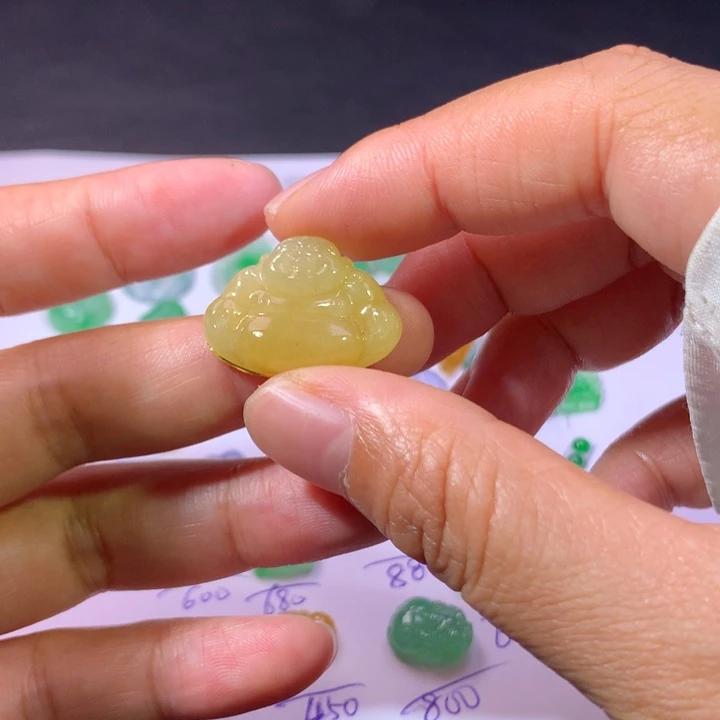 乙***你翡翠未镶嵌耳饰佛