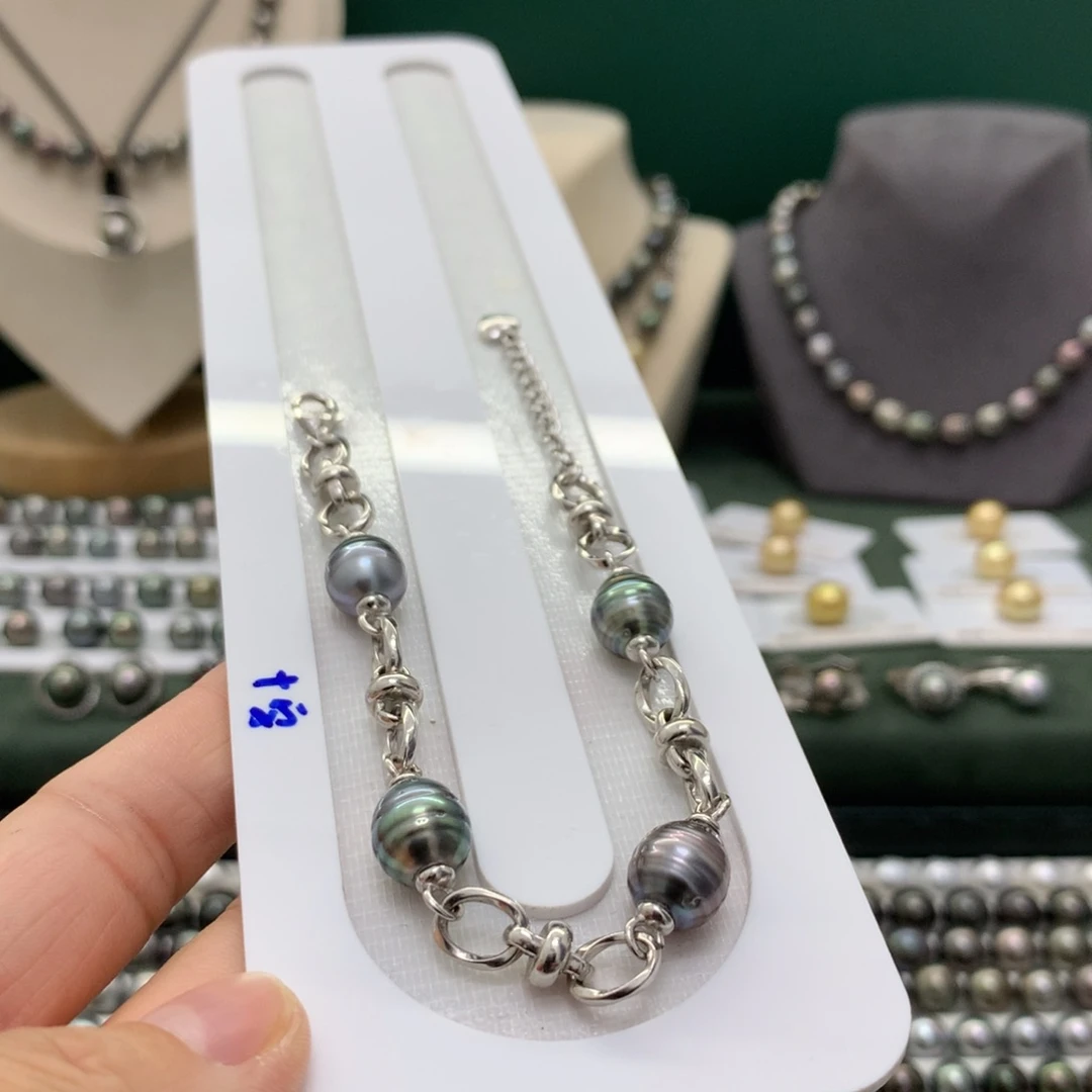 银S925镶嵌手绳海水珍珠里*。