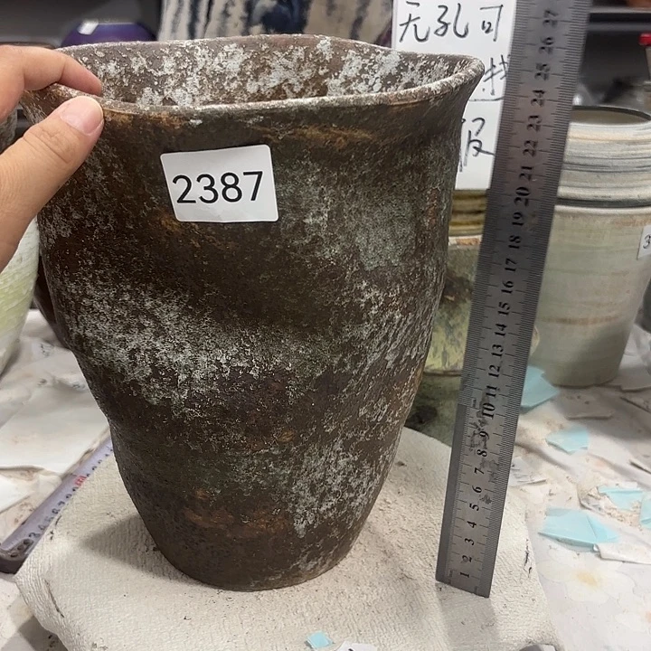 摆件高25，口18，到20，2387，有孔