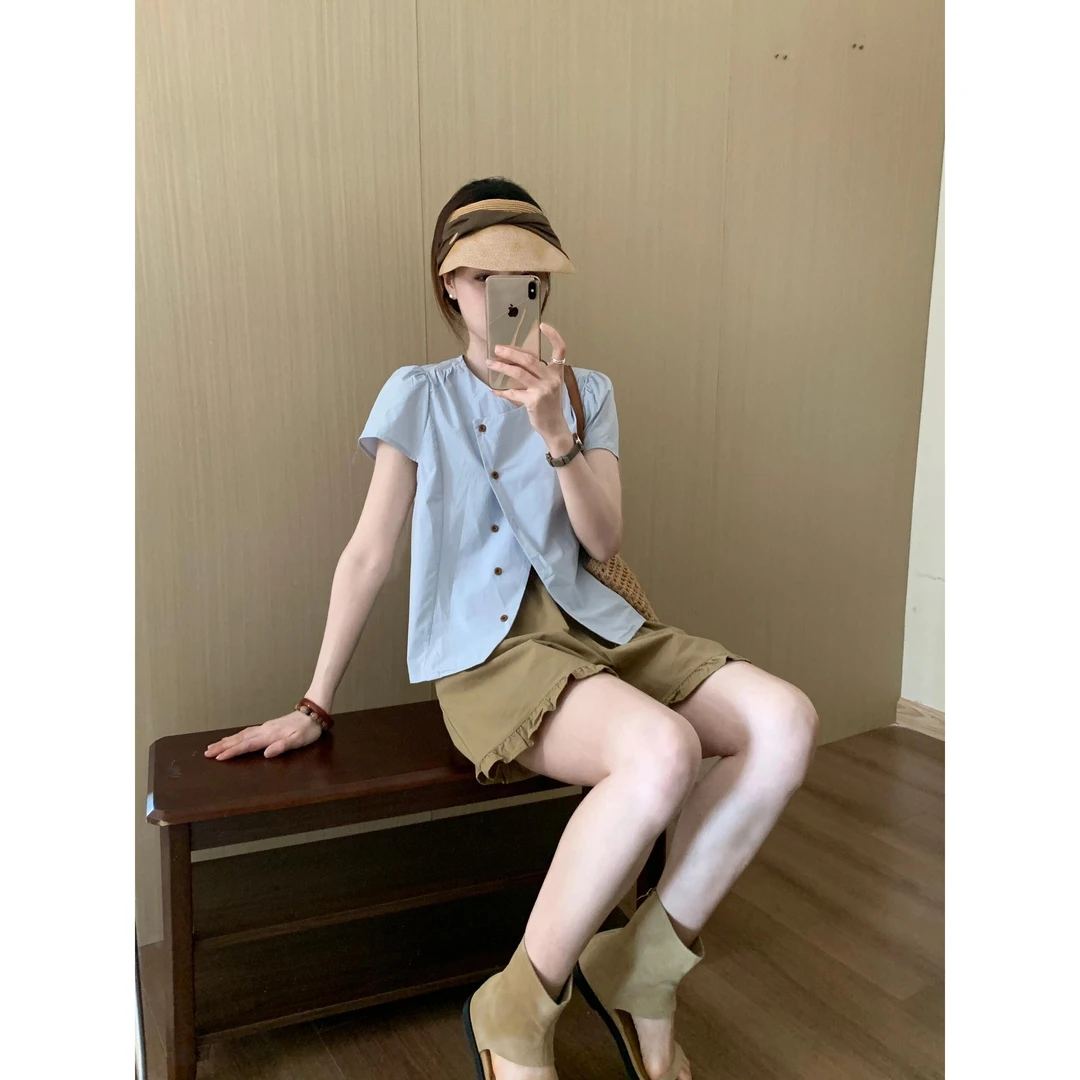 韩系不规则斜扣衬衫女夏季设计感短袖衬衣别致短款小飞袖上衣套装