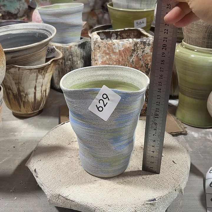 陶摆件高15，口9到11，有孔，629