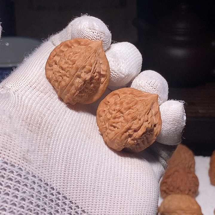 凛***凛文玩核桃手把件野生寿桃