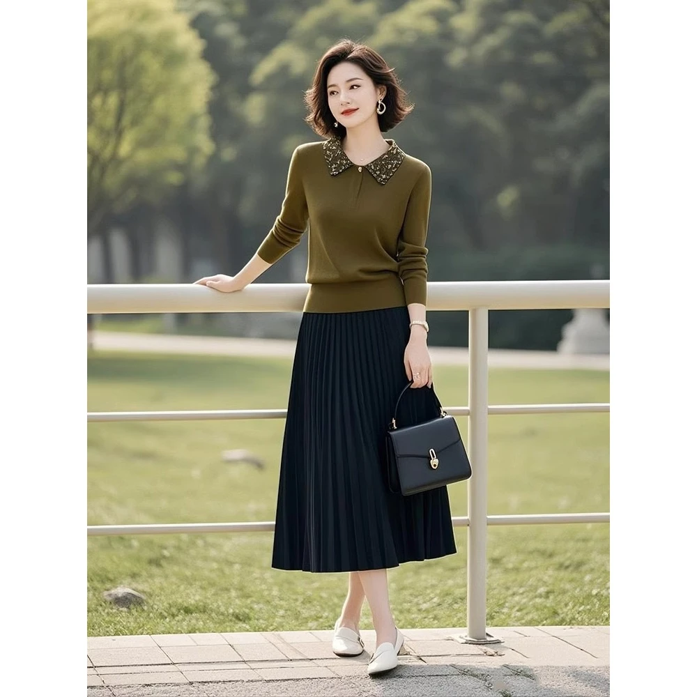 今年流行的针织套装女装2025秋季新款polo领上衣百褶半身裙两件套