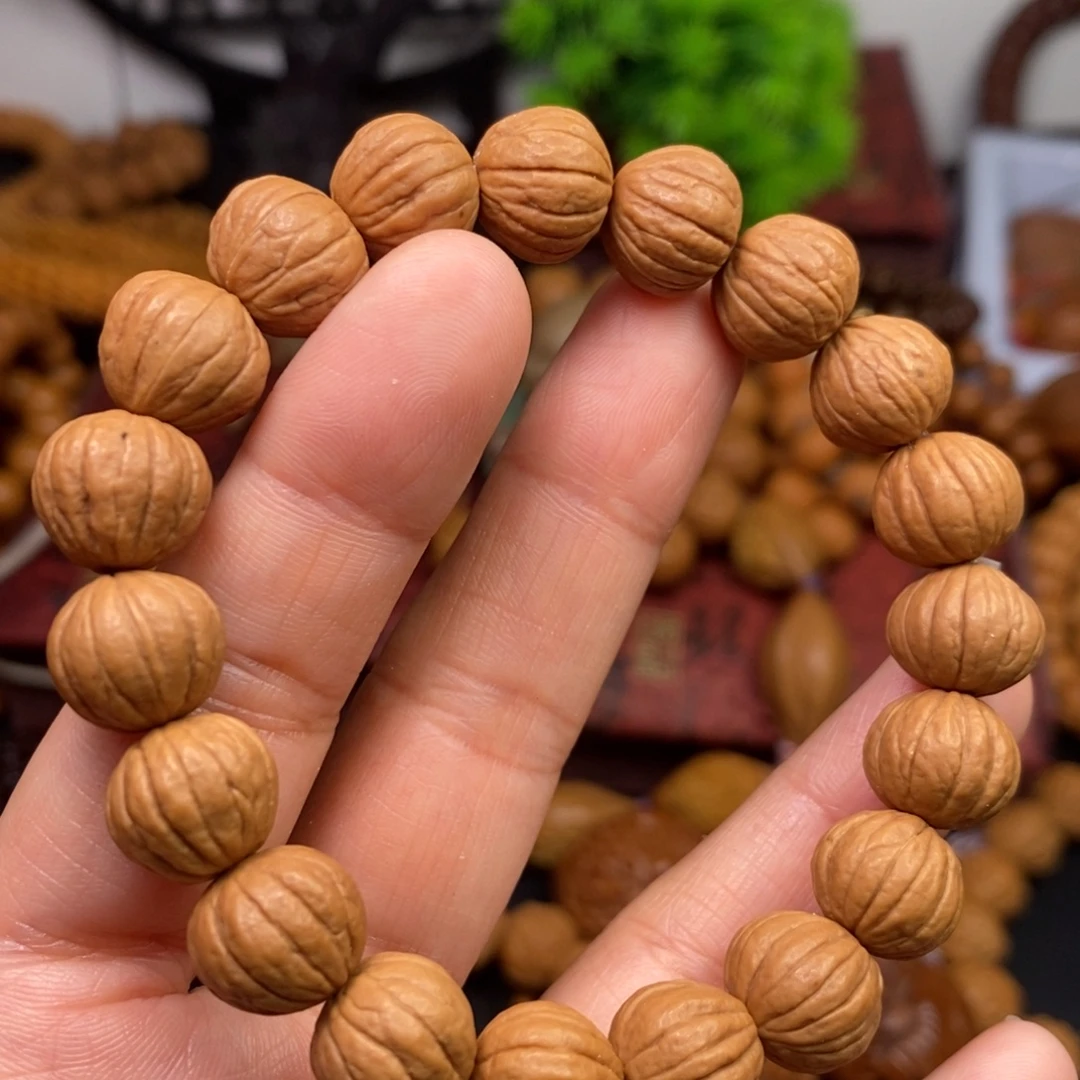 用***多橄榄核吊坠橄榄核桃