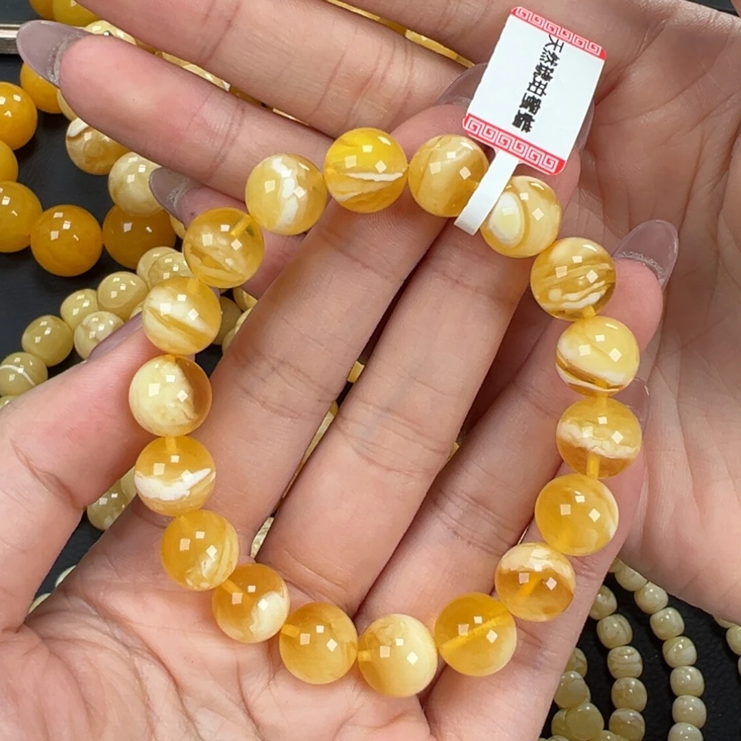 郁***月琥珀未镶嵌手链14.2金瓷白