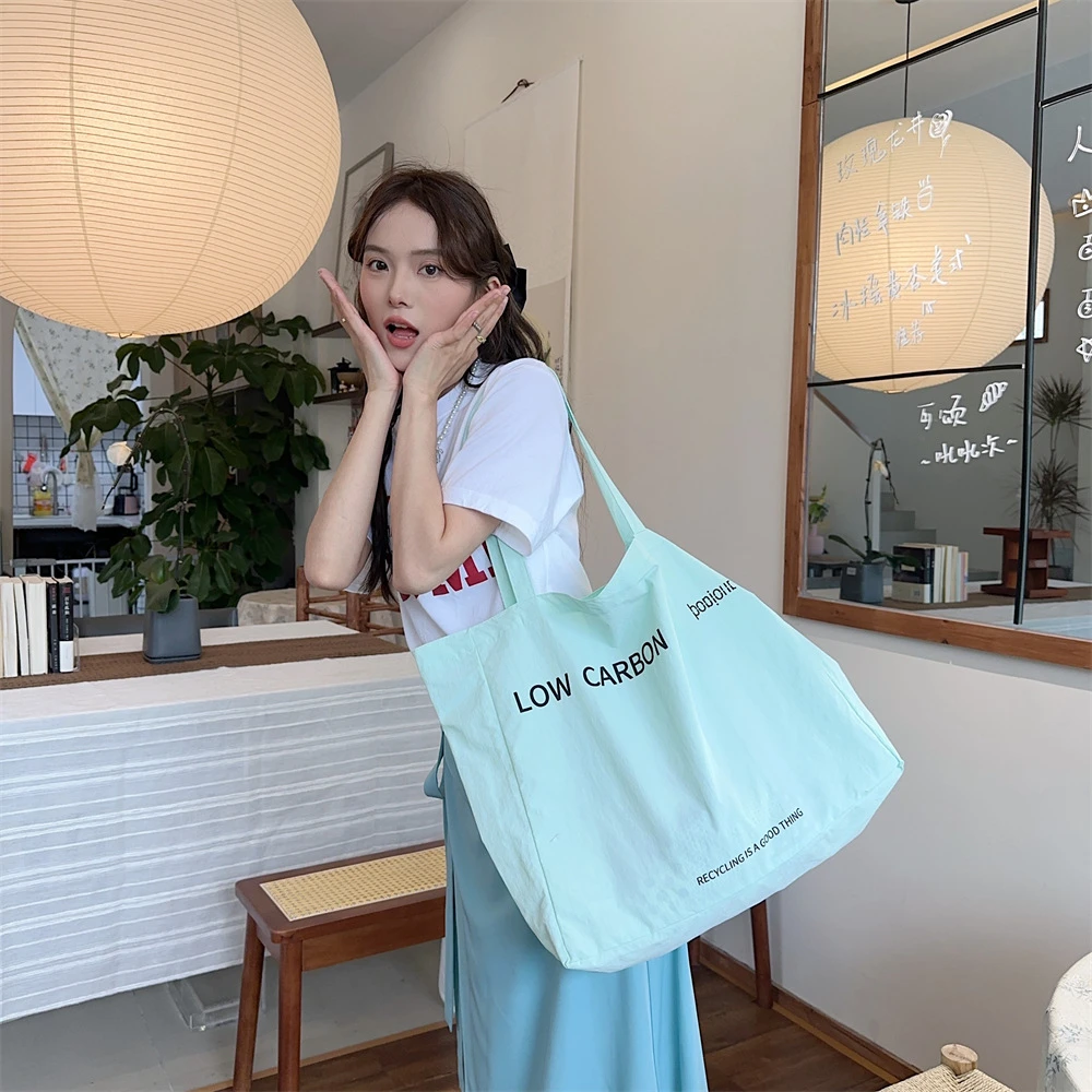 自制热巴同款大容量帆布包2025新款字母托特包ins慵懒松弛感布袋