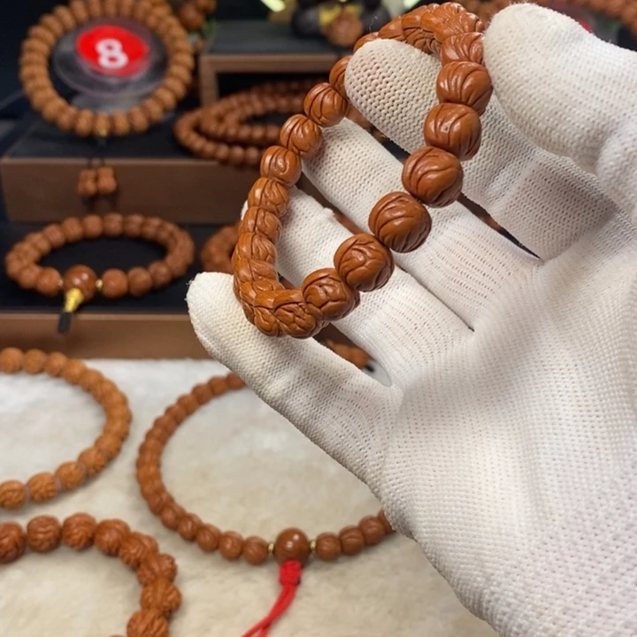 桃核吊坠T*”秦岭龙纹桃核