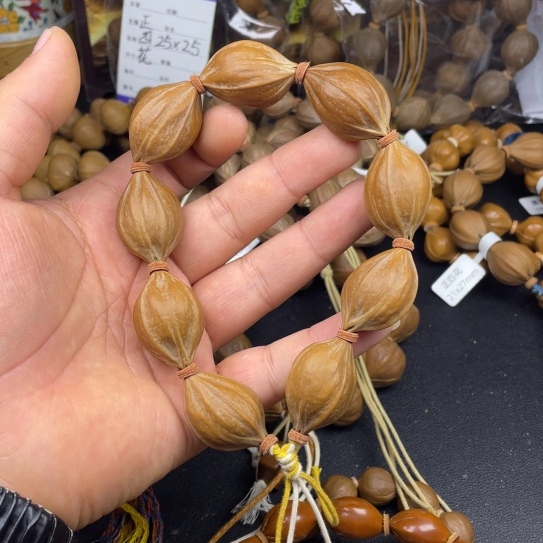 手串橄榄核红皮老料四花22mm