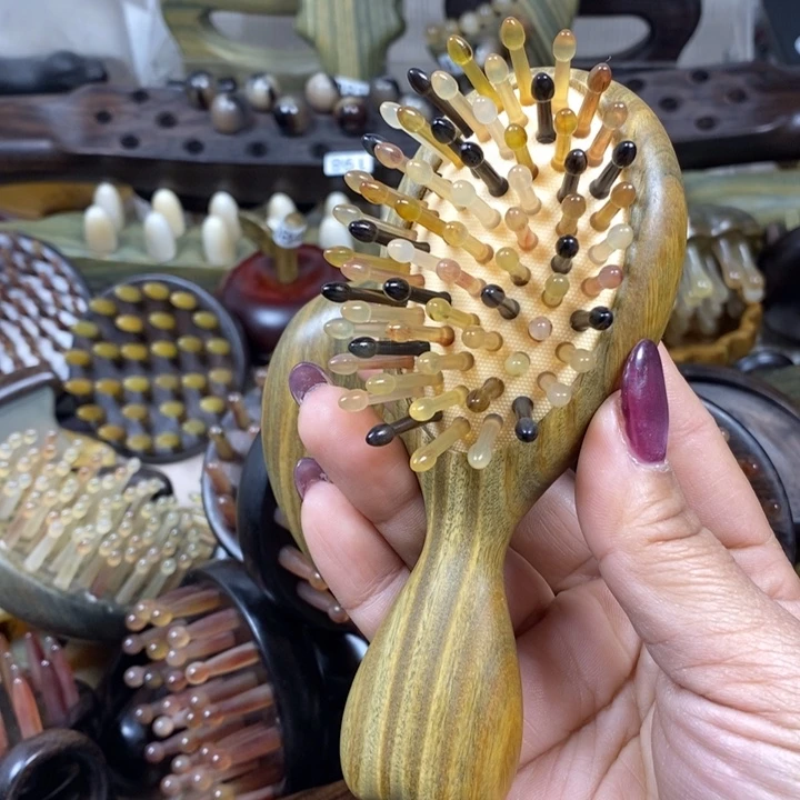 绿檀65齿羊角气垫梳一个