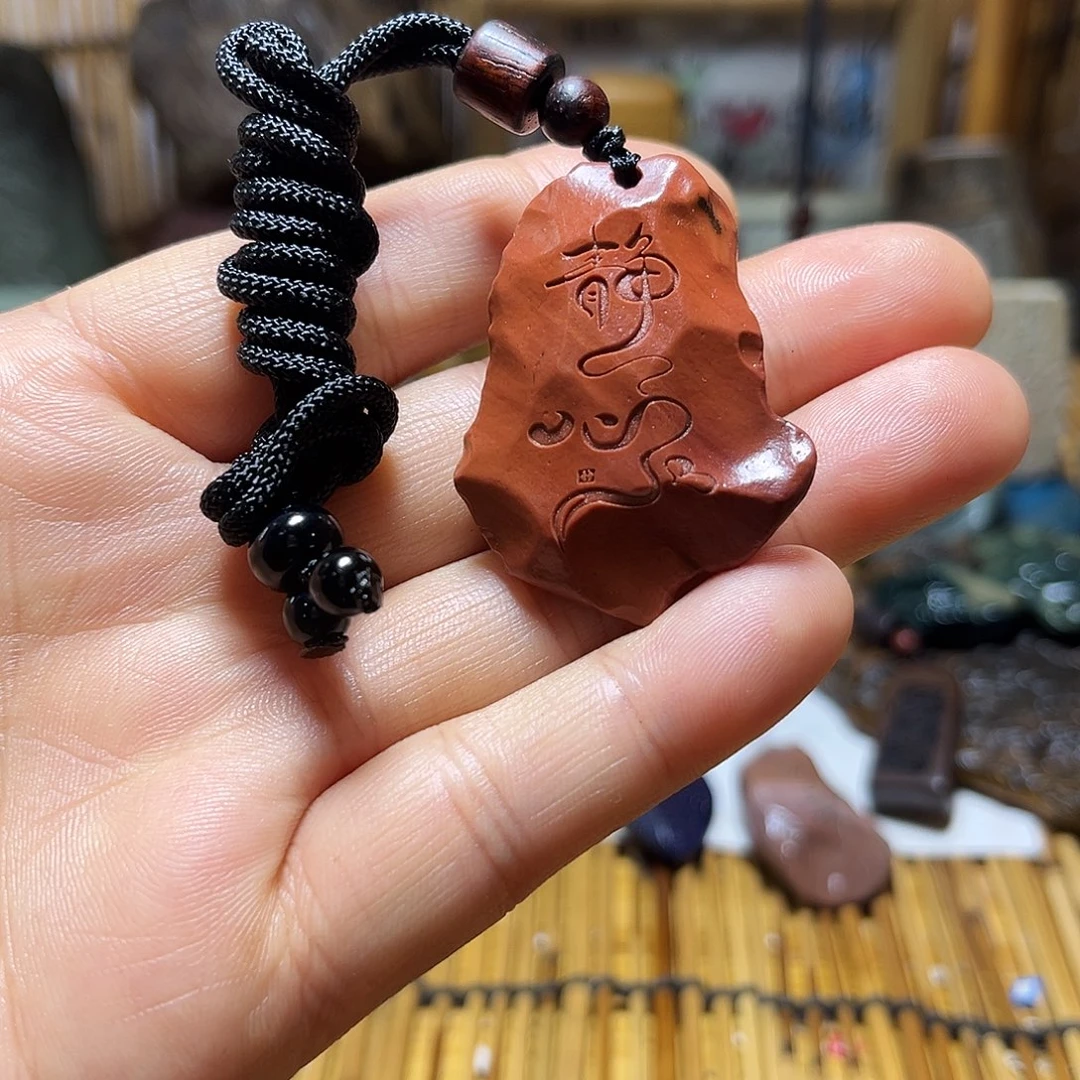 新疆原石雕刻手把件