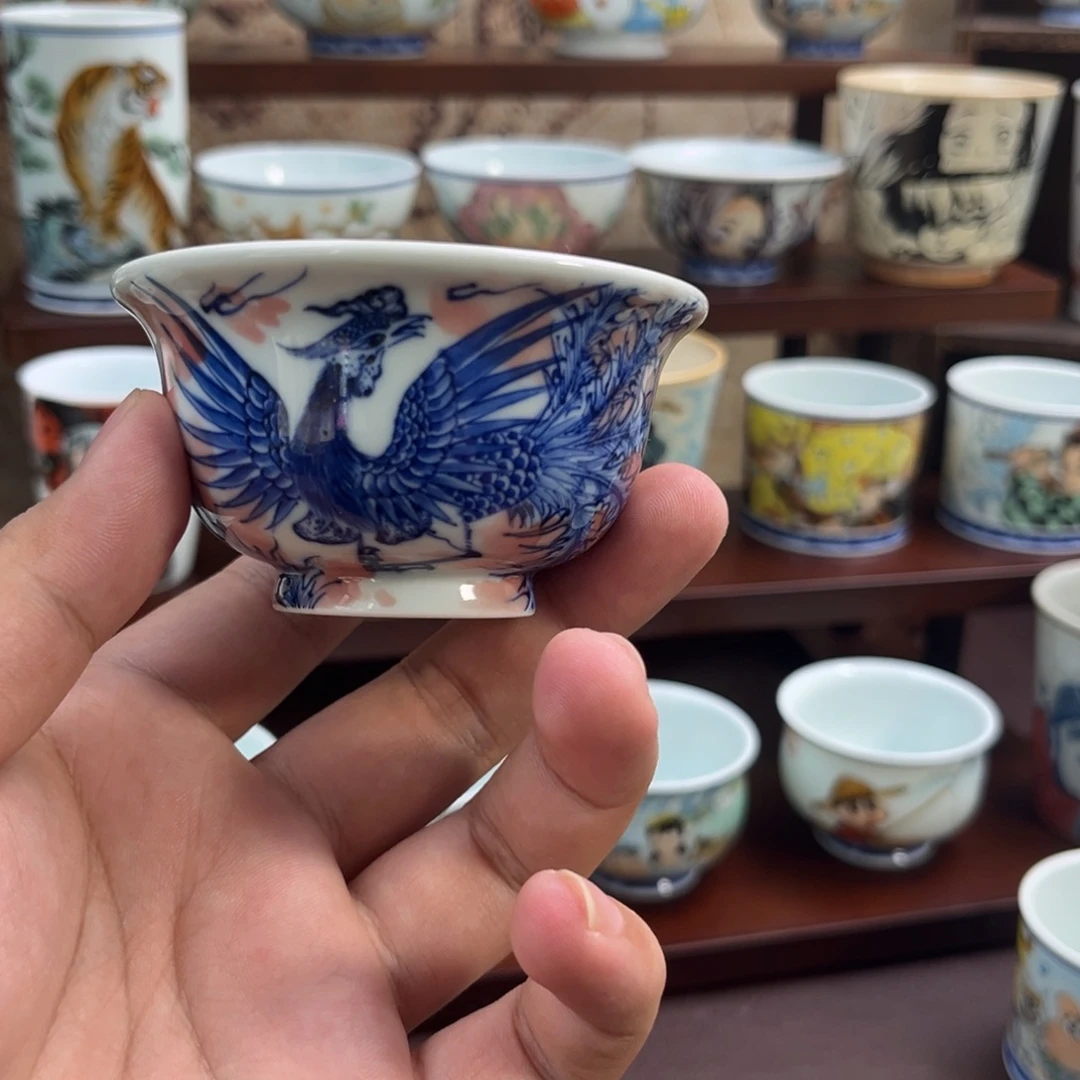 爱***墨手绘凤凰压手杯子