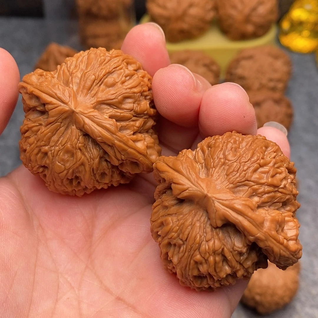 文玩核桃把件43全品红皮南疆石