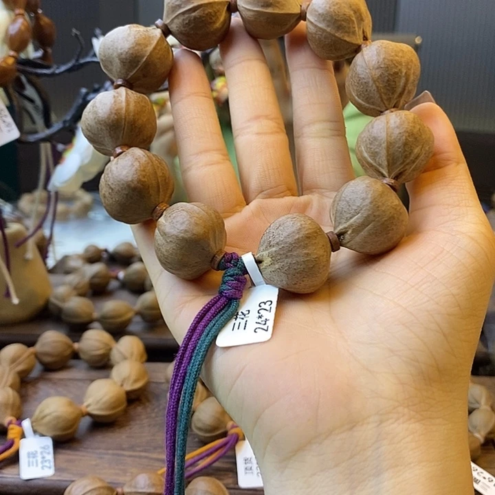 叽***喳橄榄核吊坠梅林铁核