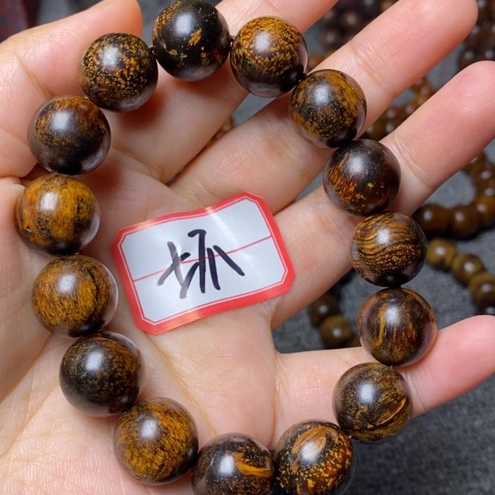 贡木手串印贡1.5瑕疵