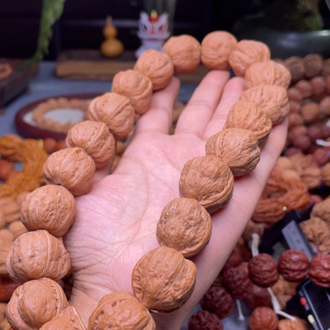 冯***进文玩核桃手串秋子