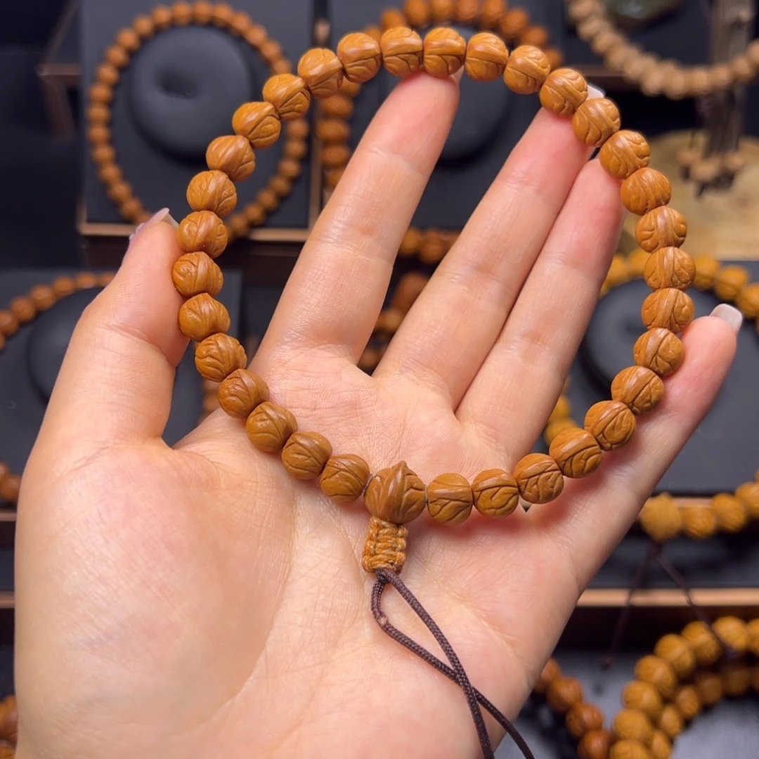 东***宅手串桃核野生玉龙脊0.9