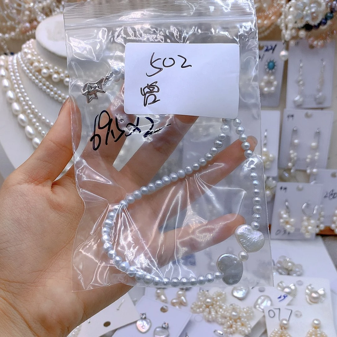 银S925镶嵌淡水珍珠发饰曾**上