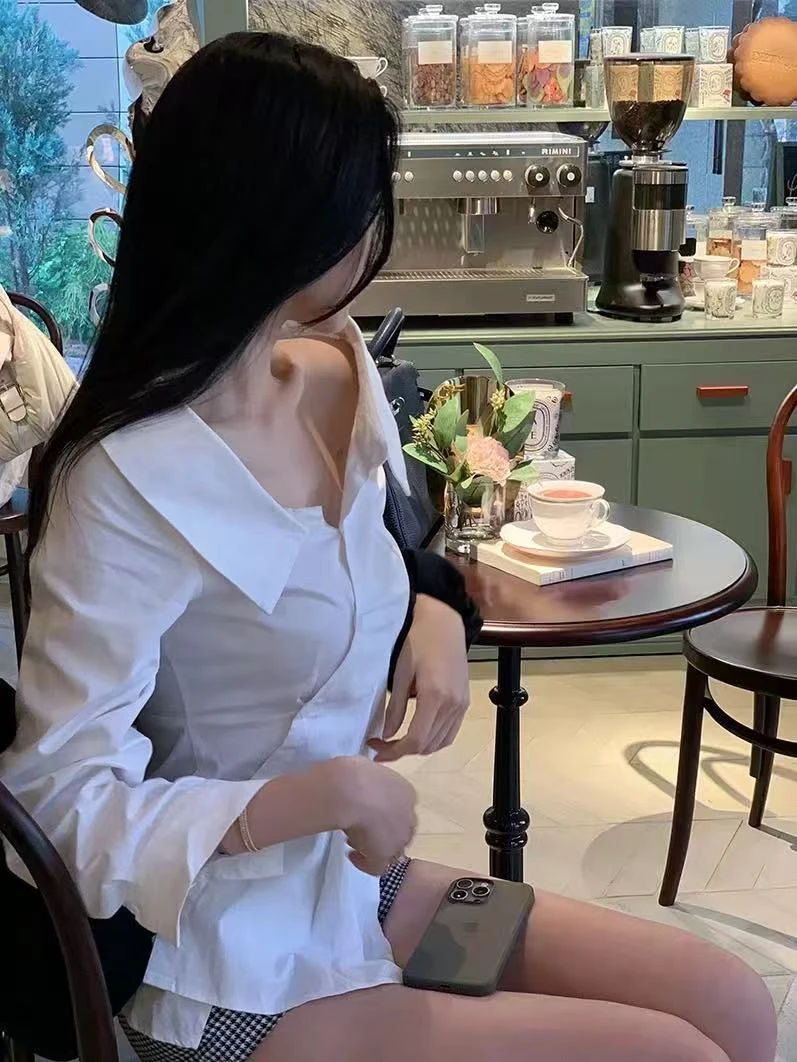 法式纯欲性感长袖设计感衬衫女不规则百搭显瘦衬衣修身上衣春秋季