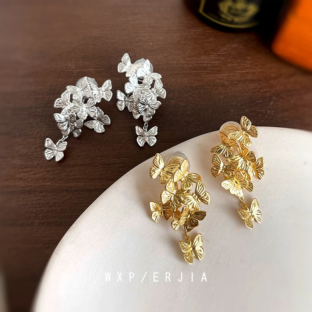 铜合金亚克力耳饰 群蝶飞舞镀真金蚊香盘耳夹新中式高级轻奢婚嫁