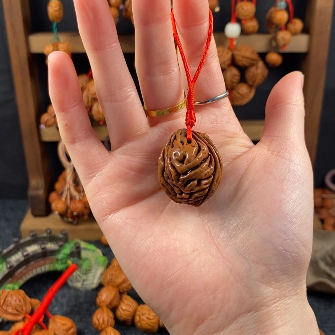 吊坠桃核桃枭手串