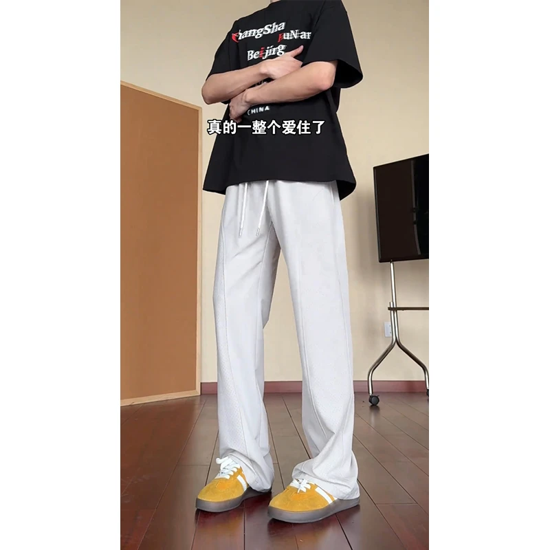 激光打孔网眼透气冰丝裤男夏季速干裤美式机能显瘦斜切直筒弯刀裤