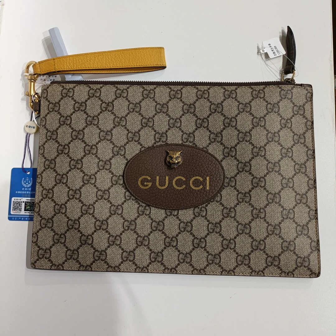 95新 GUCCI/古驰 棕色经典印花金属 虎头 男士手拿包 夹子