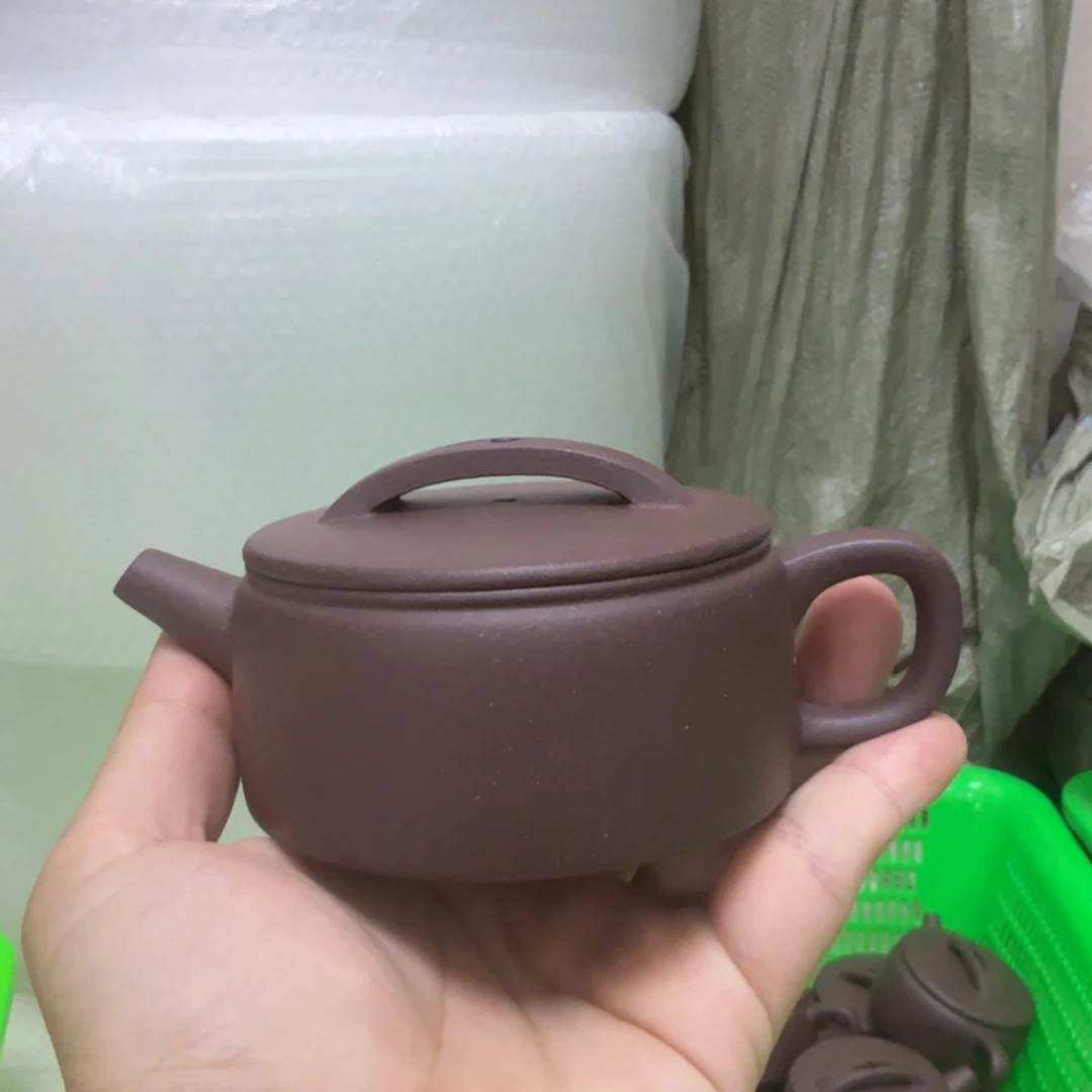 茶杯紫砂微瑕的壶