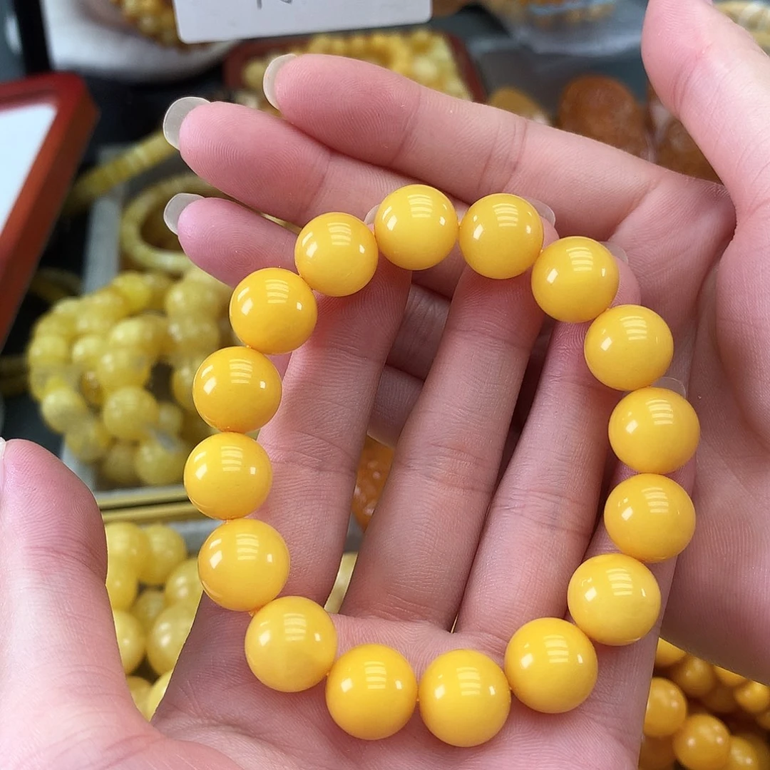 起***难未镶嵌琥珀裸石鸡油黄13