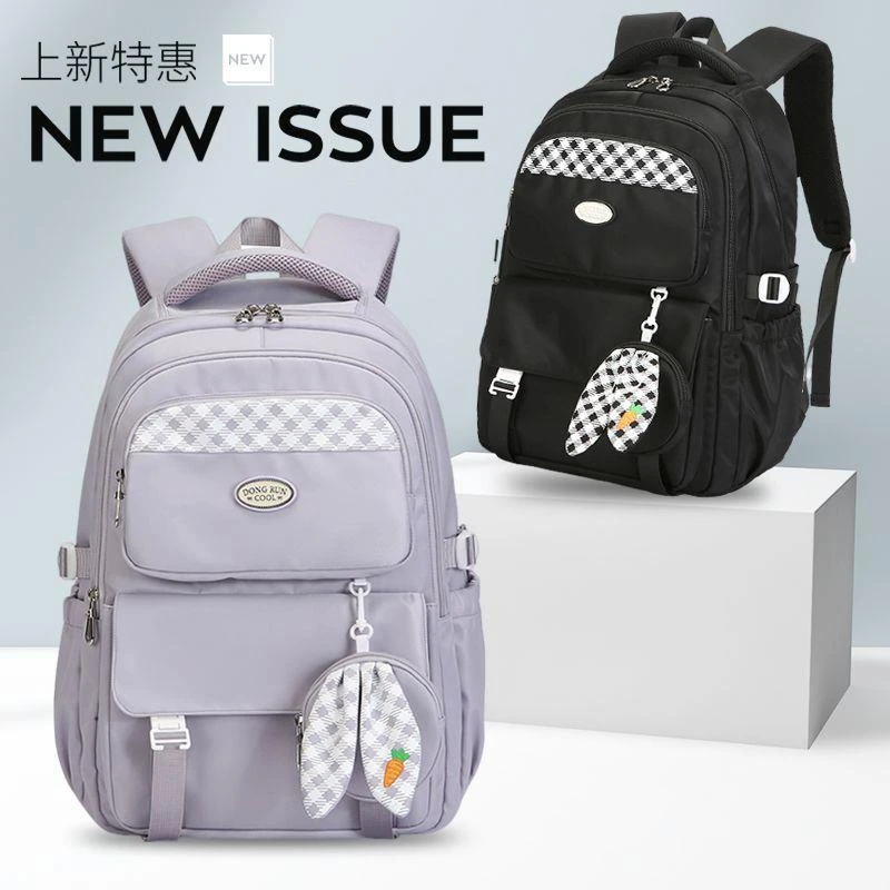 韩版书包初中生轻便大容量背包小学生五六年级男女孩减负双肩背包