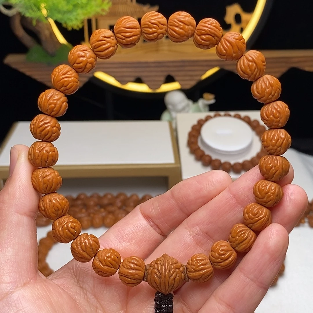 桃核手串11mm野生凤羽聚宝盆桃核手持27颗