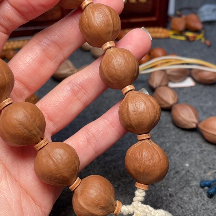 橄榄核吊坠小**跑橄榄核