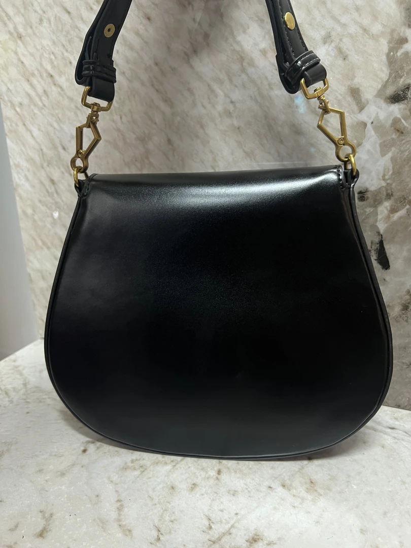 YNPO24年秋冬新款重工女包叉马蹄