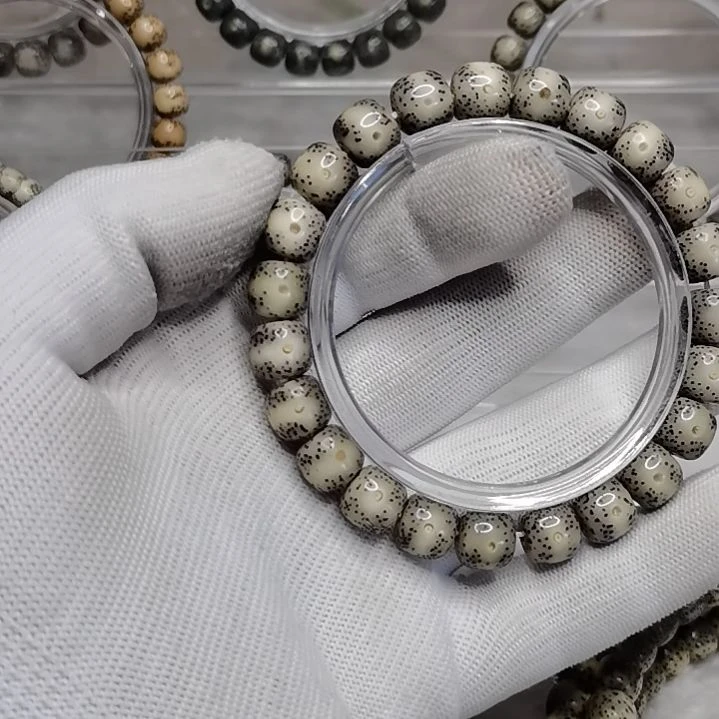 卟****_海南星月菩提单圈10*9黑冰a17