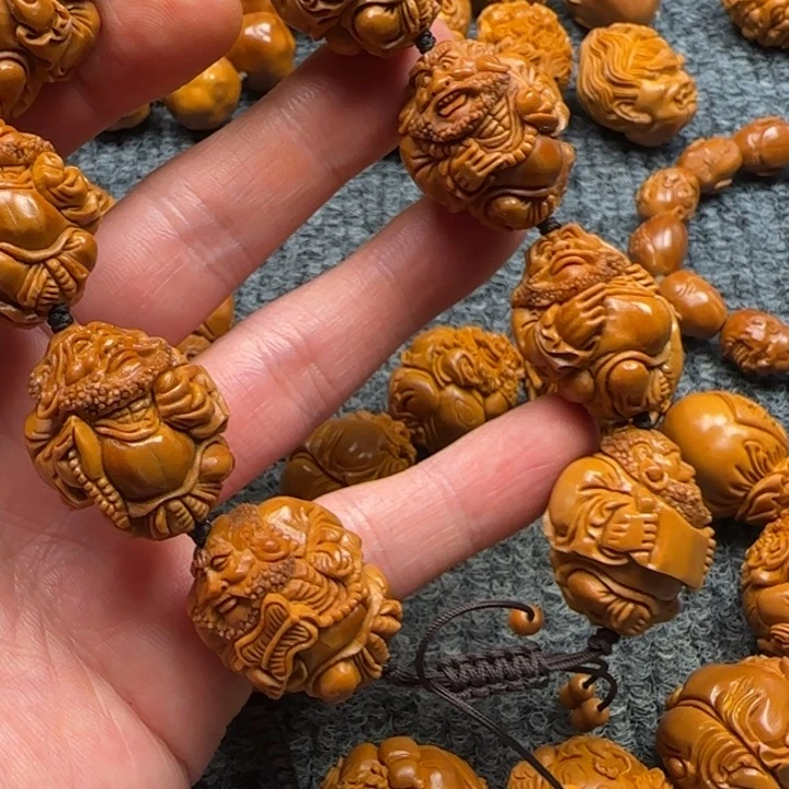 橄榄核吊坠达摩呀呀