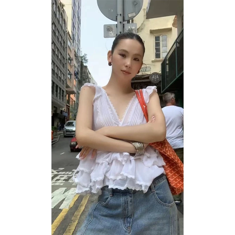 法式甜美风2025春季系新款纯欲性感小众百搭不规则下摆无袖上衣女