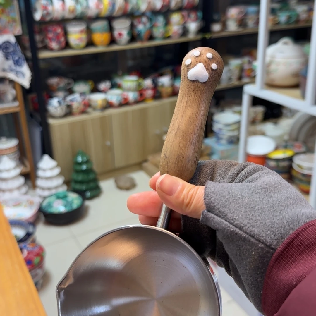 瓷深色手柄小泼油锅一只