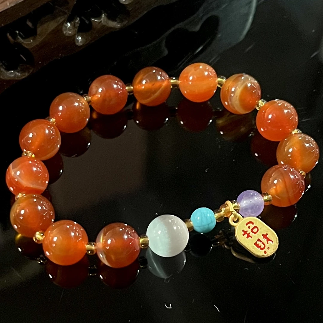 老凤祥天然玛瑙猫眼手串标277